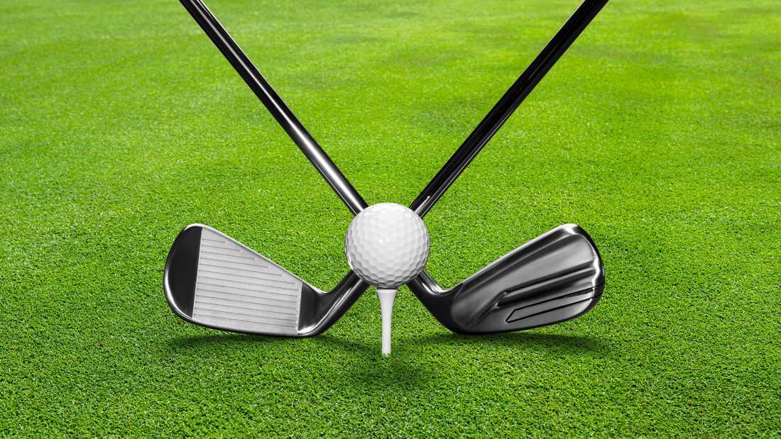 pureone golf, what golf equipment do you need, crossed golf clubs in front of golf ball on green grass